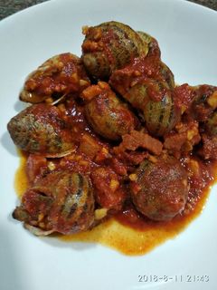 Una foto de Caracoles en salsa
