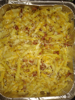Una foto de Patatas con queso y bacon