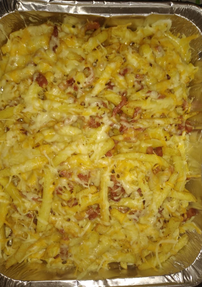 Una foto de Patatas con queso y bacon