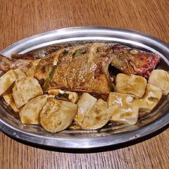 A picture of Fried Red Snapper in Black Vinegar with Tofu.