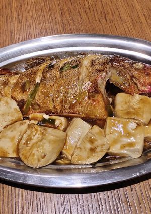 A picture of Fried Red Snapper in Black Vinegar with Tofu.