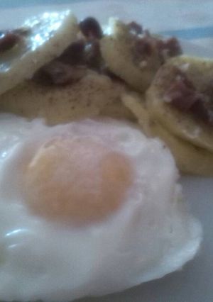 Una foto de Patatas con jamón y queso al microondas
