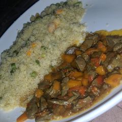 A picture of Cous cous with liver sauce.