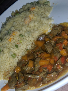 A picture of Cous cous with liver sauce.