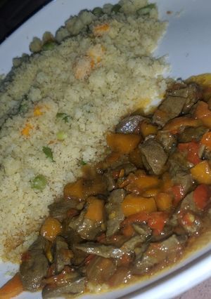 A picture of Cous cous with liver sauce.