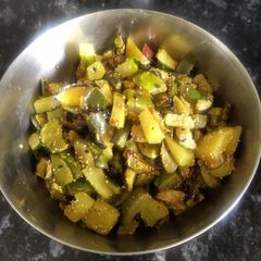 Lauki ka chilka fry or lau er khosha bhaja A picture of Lauki ka chilka fry or lau er khosha bhaja.