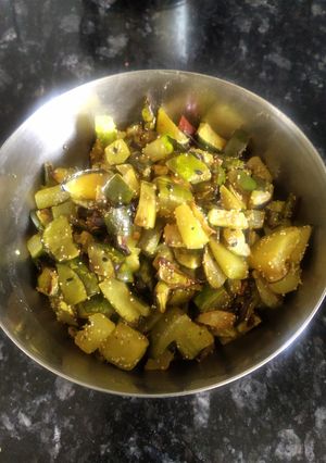 A picture of Lauki ka chilka fry or lau er khosha bhaja.
