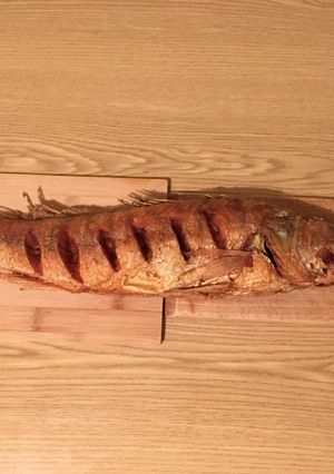 Egész süllő sütve recept fotója