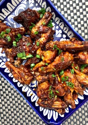 A picture of Smokey Bbq wings & Spicy Sriracha wings.