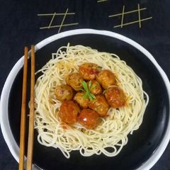 A picture of Chicken meatballs spaghetti.
