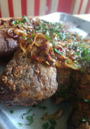 Una foto de Mojarra frita con ajillo y mantequilla al limón