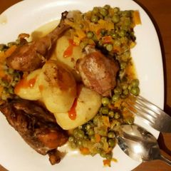 A picture of Roast potatoes served with grilled chicken and peas sauce.
