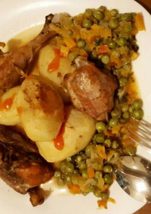 A picture of Roast potatoes served with grilled chicken and peas sauce.