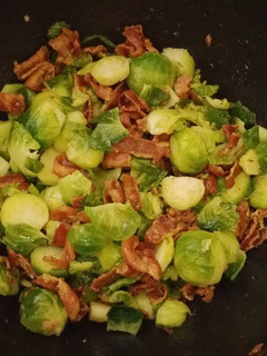 A picture of Honey glazed Brussels sprouts with bacon.