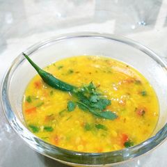 A picture of Peeli moong daal fry.