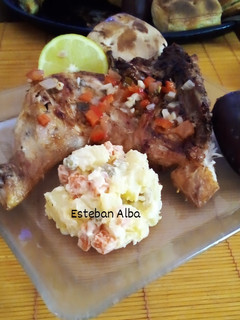 Una foto de Pollo a las brazas