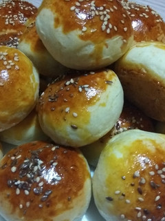 Una foto de Pancitos de ajo y queso parmesano