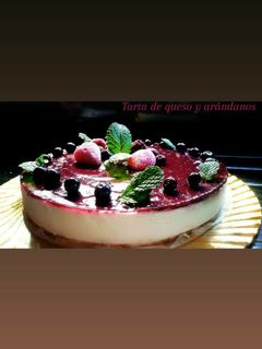 Una foto de Tarta de queso y arándanos