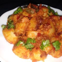 A picture of Spicy & sour potatoes.