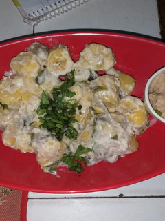 A picture of Matoke steamed with groundnuts sauce.