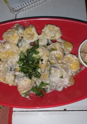 A picture of Matoke steamed with groundnuts sauce.