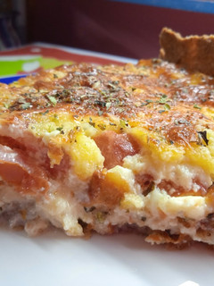 Una foto de Tarta de muzzarella, tomates y orégano 🧀🍅🍅🧀🍅🍅🧀 integral