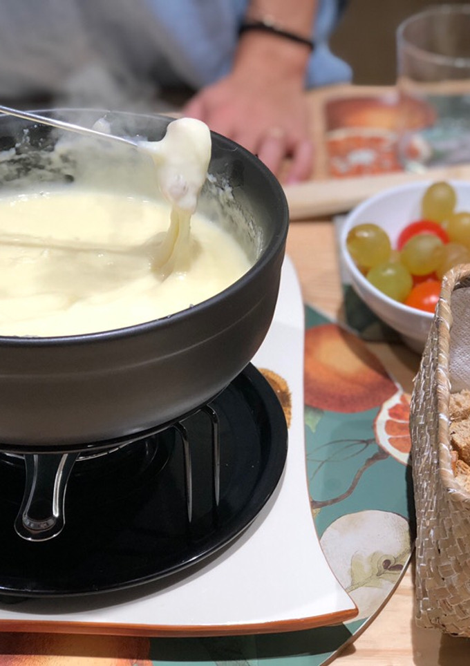 Una foto de Fondue de queso