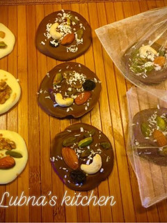 A picture of Chocolate Fruit 'n Nut Bites & Chocolate lollipop (2 recipes).