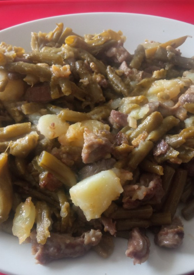 Una foto de Mollejas con judías y patata