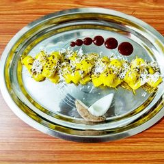 A picture of Coconut khandvi roll.