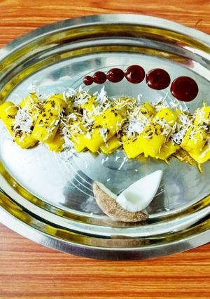 A picture of Coconut khandvi roll.