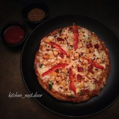 A picture of Whole wheat veg pizza.