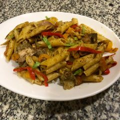A picture of Mac and bell peppers stir fry.