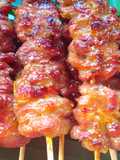 Grilled Pork Skewers with Fresh Coconut Milk (10 Baht per Skewer)