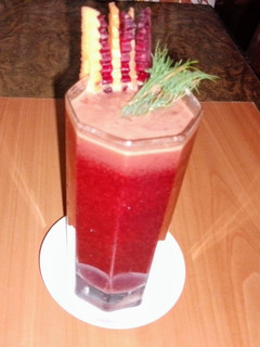 A picture of Beetroot, carrot and pomegranate juice 🥕🍯.
