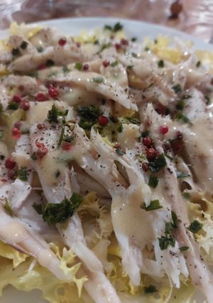 A picture of Warm Skate Wing Salad with Pink Peppercorns and Cracked Black Pepper.