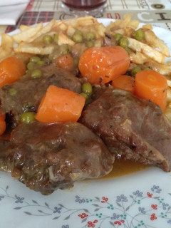 Una foto de Carrilladas de cerdo estofadas