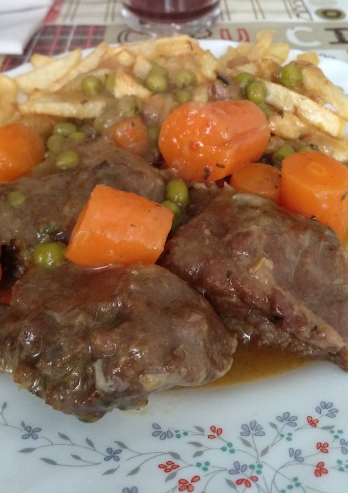 Una foto de Carrilladas de cerdo estofadas
