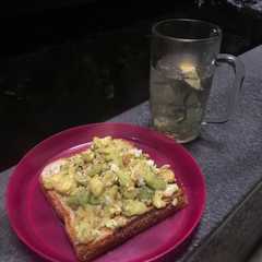 A picture of Egg Avocado toast + Lemon honey chia hot water (healthy breakfast).