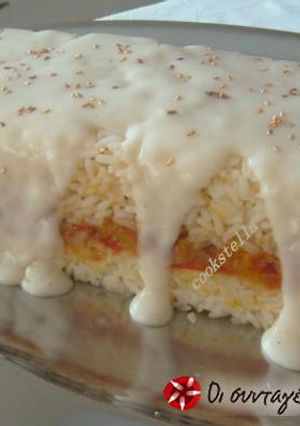 A picture of Rice Mold with Cheese Sauce.