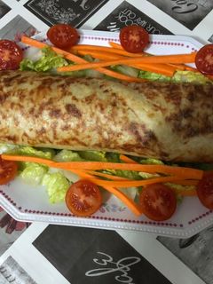 Una foto de Enrollado de jamón y queso