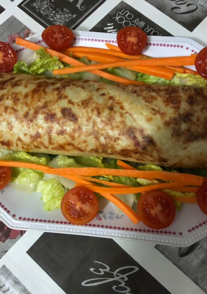 Una foto de Enrollado de jamón y queso