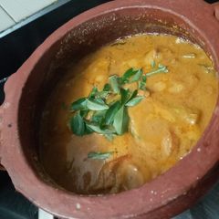 A picture of Dried prawns Raw mango curry.