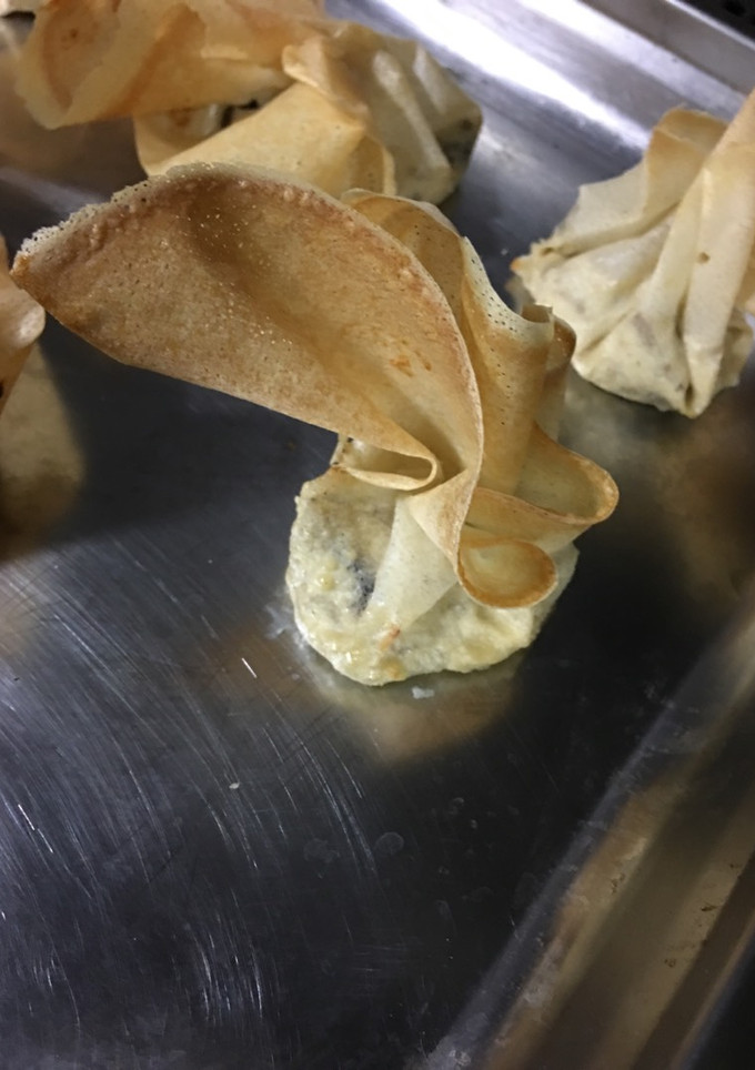 Una foto de Saquitos rellenos de champiñones