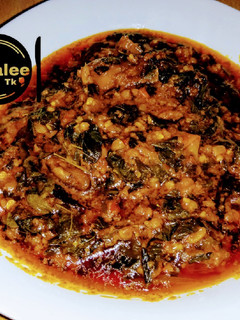 A picture of Special moringa soup with fry groundnuts.