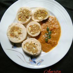 A picture of Stuffed glass idli with Kongunadu masala.
