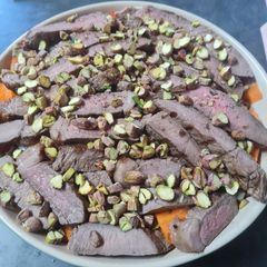 A picture of Italian Beef Salad with a Thai Twist.