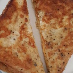 A picture of French toast with cheese.
