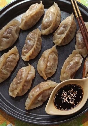 Una foto de Gyozas de confit de pato