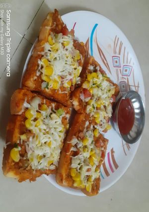 મેક્સિકન બ્રેડ પીઝા (maxican bread pizza recipe in gujarati) રેસીપી મુખ્ય ફોટો